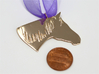 the Dakota Pendant - Precious Metals 3d printed Ribbon and penny not included. Penny for scale