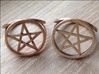 Pentacle ring (customize) 3d printed Comparing the styles of pentacles. On the left is the braided pentacle in raw bronze, on the right is the standard pentacle in raw brass. 