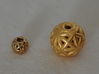 torus_pearl_loop_type4_normal 3d printed Polished Brass is Small and Polished Gold Steel is Medium.