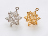 Stellated Dodecahedron Bauble 3d printed Rhodium Plated Brass (left) vs 18k Gold Plated Brass (right)
