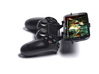 Controller mount for PS4 & Lenovo A880 3d printed Side View - A Samsung Galaxy S3 and a black PS4 controller