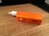 Design 2 - 18650 - Gripper Body 3d printed Polished Orange Body, Polished White Buttons and White Plume Veil RDA