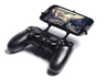 Controller mount for PS4 & Huawei Ascend W1 3d printed Front View - A Samsung Galaxy S3 and a black PS4 controller
