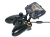 Controller mount for Xbox 360 & Alcatel Pop C1 3d printed Side View - A Samsung Galaxy S3 and a black Xbox 360 controller